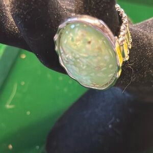 Stretch ring. Beautiful mint color. Was specs of other colors inside.​​